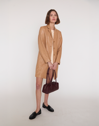 HYER GOODS La Strada East West shoulder bag in burgundy with leather strap and minimalist design.