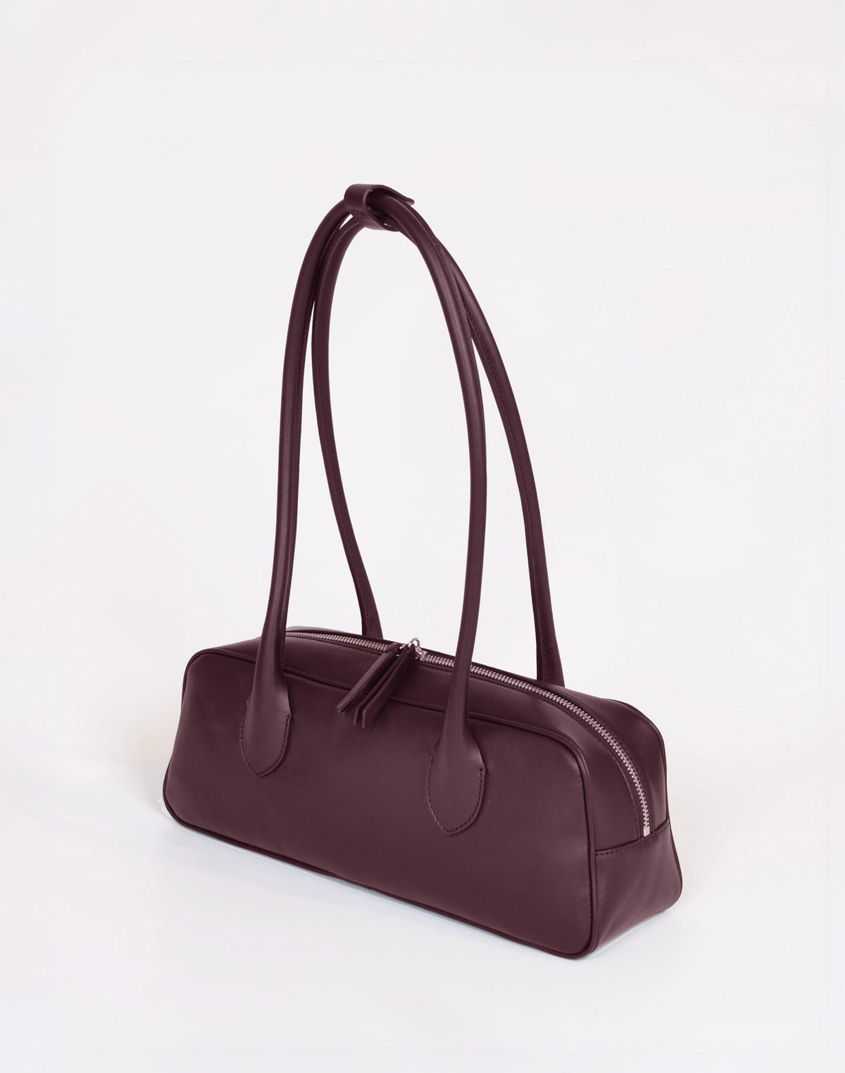 HYER GOODS La Strada East West Shoulder Bag in burgundy, showcasing its stylish design and compact size.