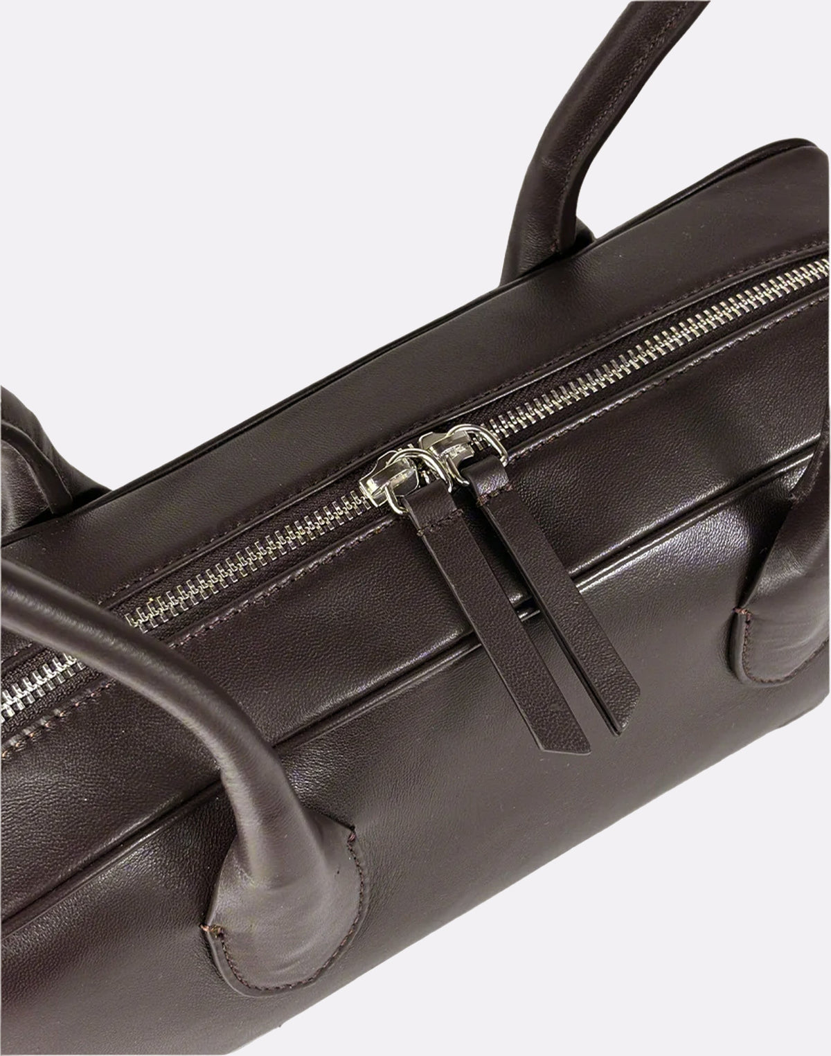 HYER GOODS La Strada East West shoulder bag in chocolate leather with detailed stitching and sleek design.