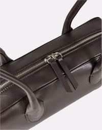 HYER GOODS La Strada East West shoulder bag in chocolate leather with detailed stitching and sleek design.