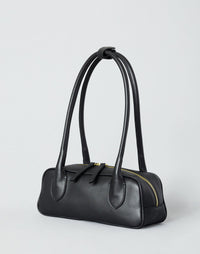 Black and gold Mini La Strada East West Shoulder Bag by HYER GOODS with sleek design and adjustable strap.