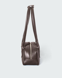 HYER GOODS Mini La Strada East West Shoulder Bag in chocolate silver leather with gold-tone hardware and adjustable strap.