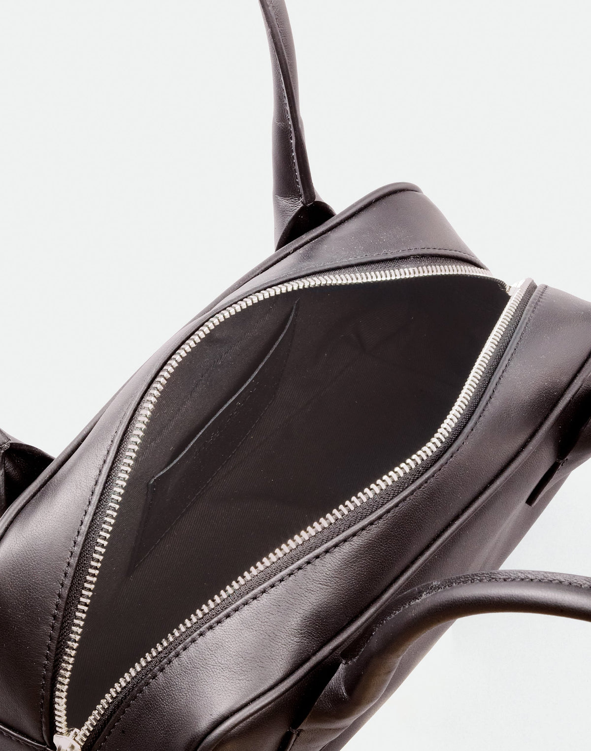 HYER GOODS Mini La Strada East West Shoulder Bag in chocolate silver leather, showcasing its compact design and stylish details.