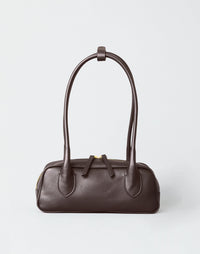 HYER GOODS Mini La Strada East West shoulder bag in chocolate gold leather, featuring a compact design and sleek style.