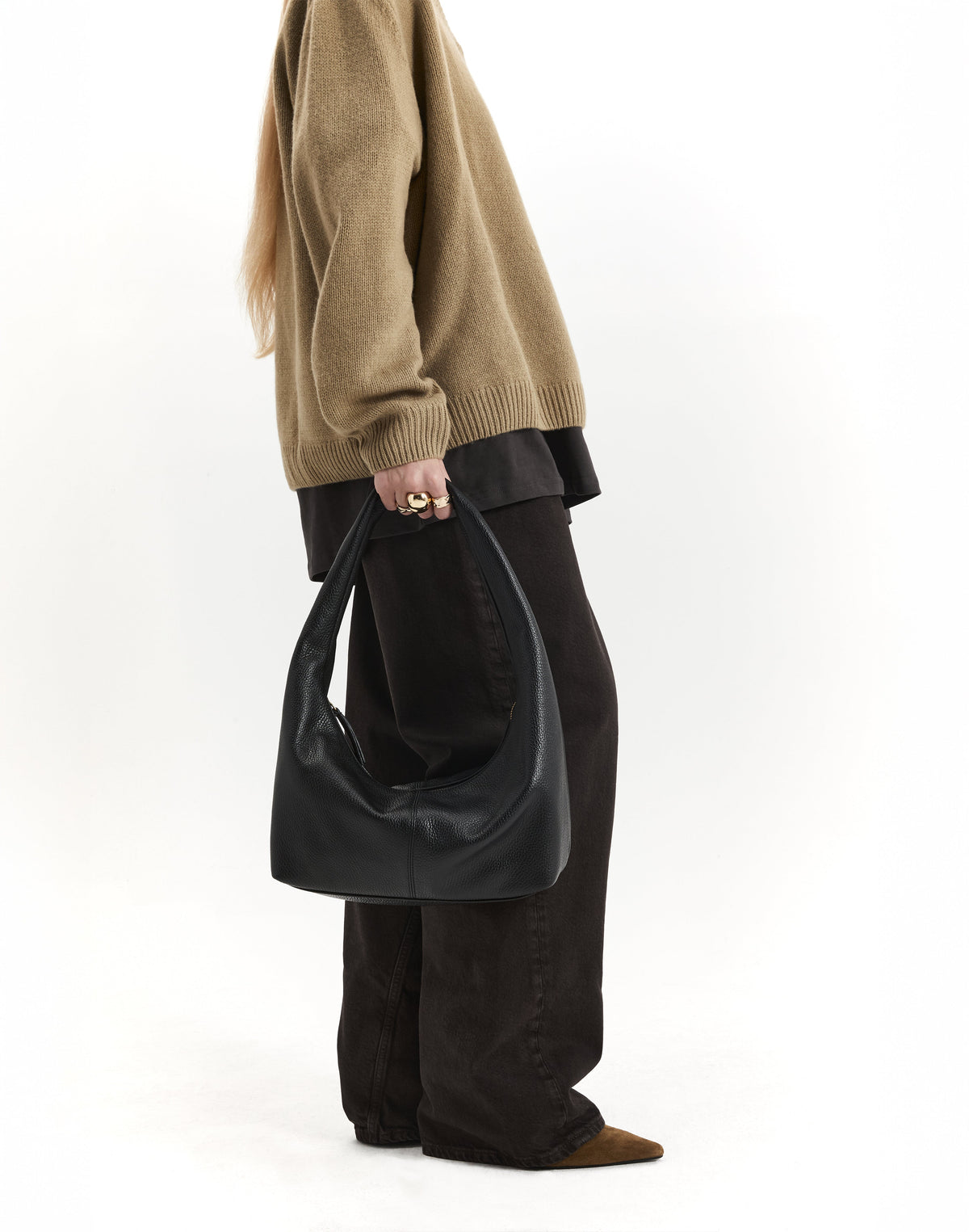 Black and gold leather shoulder bag by HYER GOODS, featuring a sleek design and adjustable strap for everyday use.