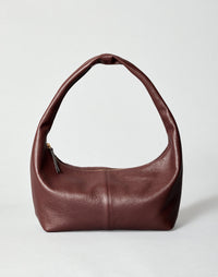 HYER GOODS Everyday Shoulder Bag in burgundy gold with adjustable strap and minimalist design, displayed on a plain background.
