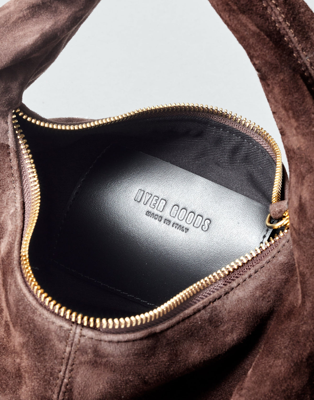 HYER GOODS Everyday Shoulder Bag in chocolate suede, showcasing its sleek design and soft textured material.