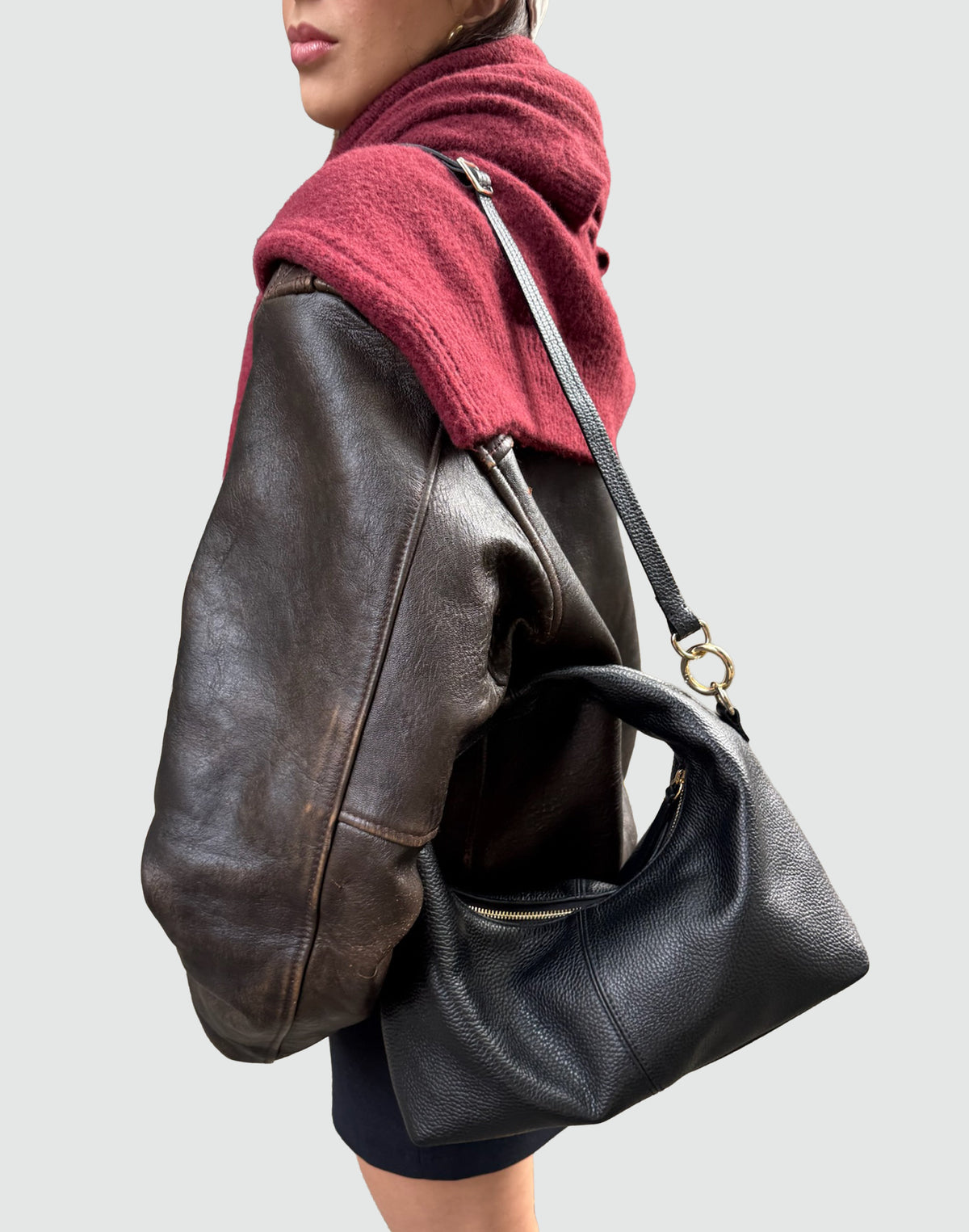 HYER GOODS Mini Everyday Shoulder Bag in black with gold accents, shown on a grey background, stylish compact shoulder bag.
