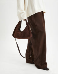 Mini Everyday Shoulder Bag by HYER GOODS in chocolate suede, showing the compact shoulder bag with sleek design and soft texture.