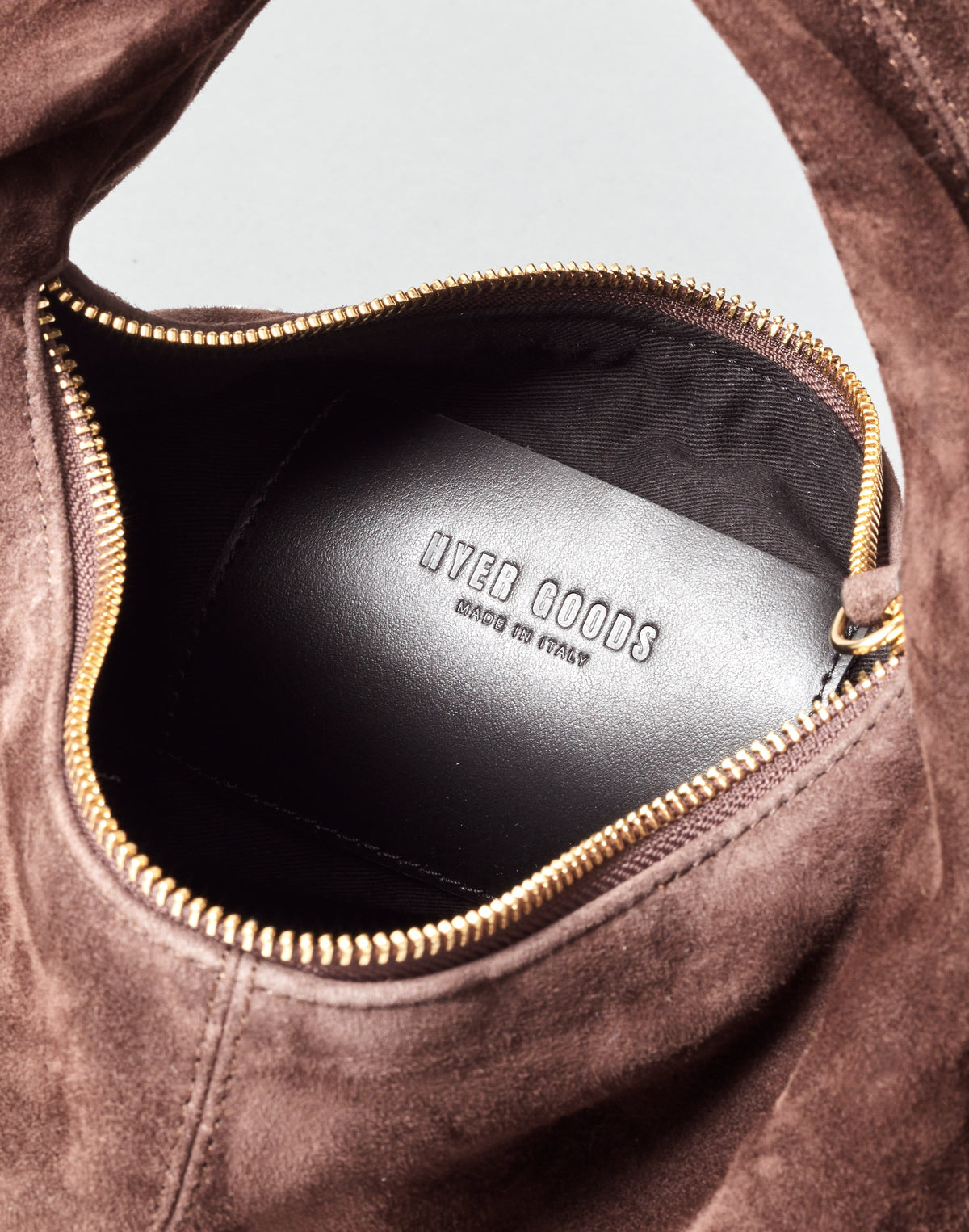 HYER GOODS Mini Everyday Shoulder Bag in chocolate suede, showing its compact design and sleek shoulder strap.