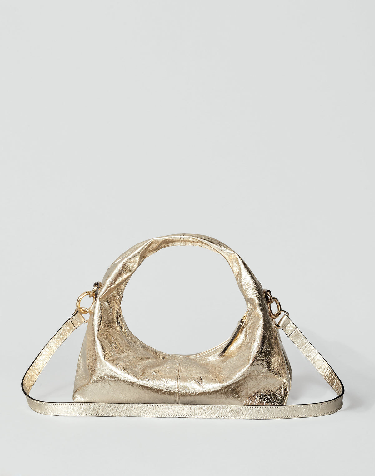 Gold Mini Everyday Shoulder Bag by HYER GOODS, featuring a compact design with a sleek strap and minimalist style.