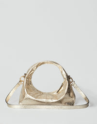 Gold Mini Everyday Shoulder Bag by HYER GOODS, featuring a compact design with a sleek strap and minimalist style.