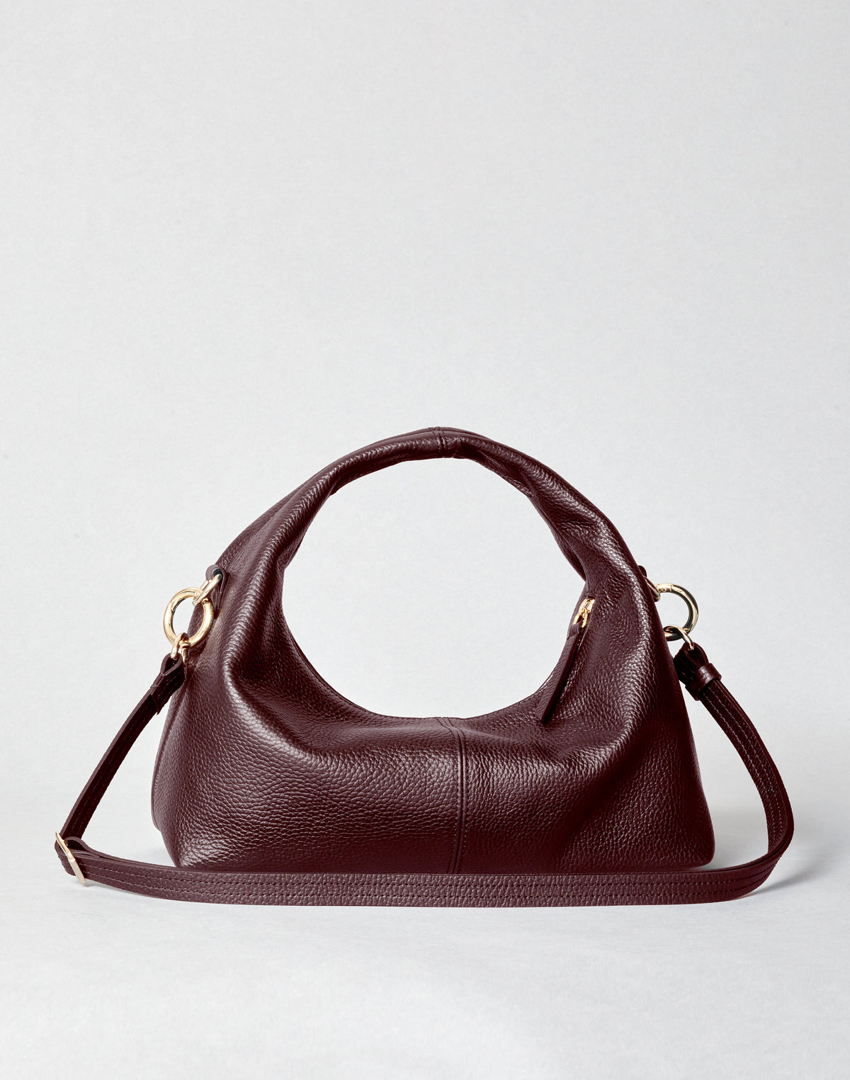 HYER GOODS Mini Everyday Shoulder Bag in burgundy with gold accents, compact design, and adjustable shoulder strap.