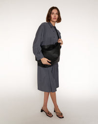 Black HYER GOODS Mercato Tote Bag with soft fabric and crossbody strap, showing a spacious, stylish tote bag for everyday use.