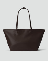 Dark chocolate brown HYER GOODS Mercato tote bag with soft leather material and spacious design, shown with handles and top view.