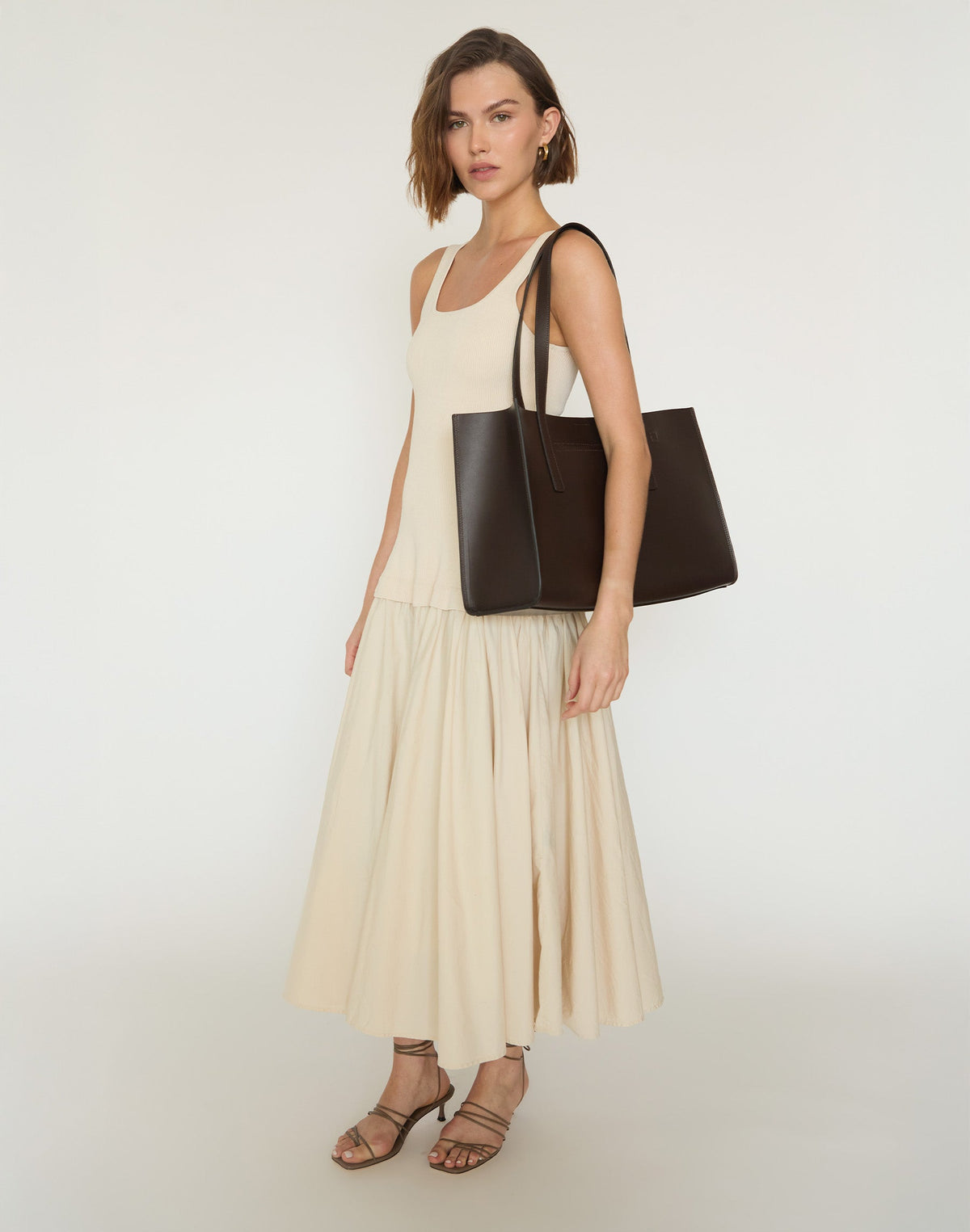HYER GOODS Tolentino Tote Bag in chocolate brown, showing sturdy handles and spacious interior with a minimalist design.