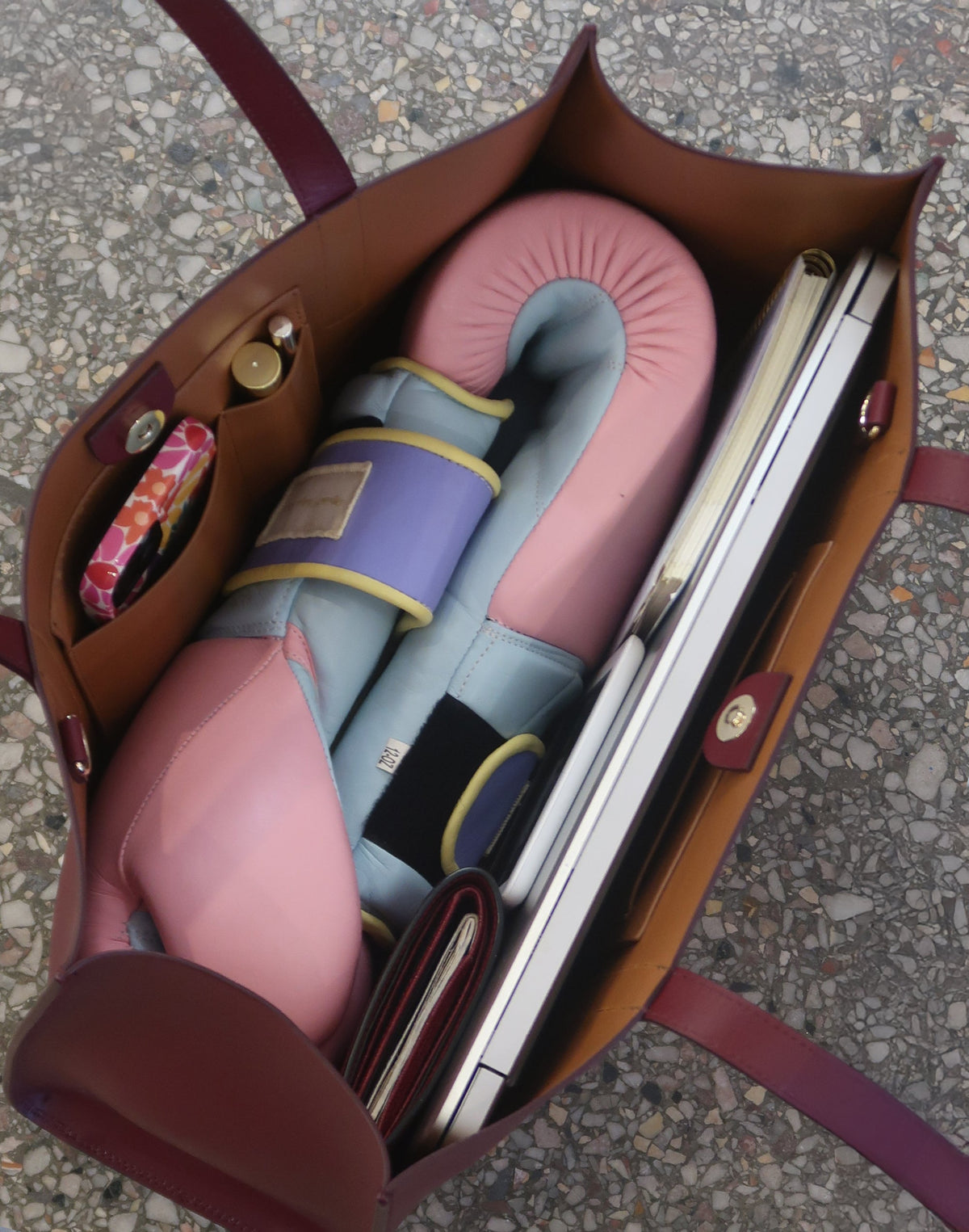 Inside view of the burgundy HYER GOODS Tolentino Tote bag showing spacious interior and sturdy leather handles.