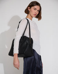Black La Autostrada tote bag by HYER GOODS featuring durable fabric and spacious interior for everyday use.