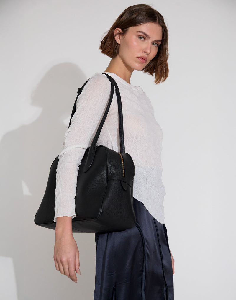 Black La Autostrada tote bag by HYER GOODS featuring durable fabric and spacious interior for everyday use.