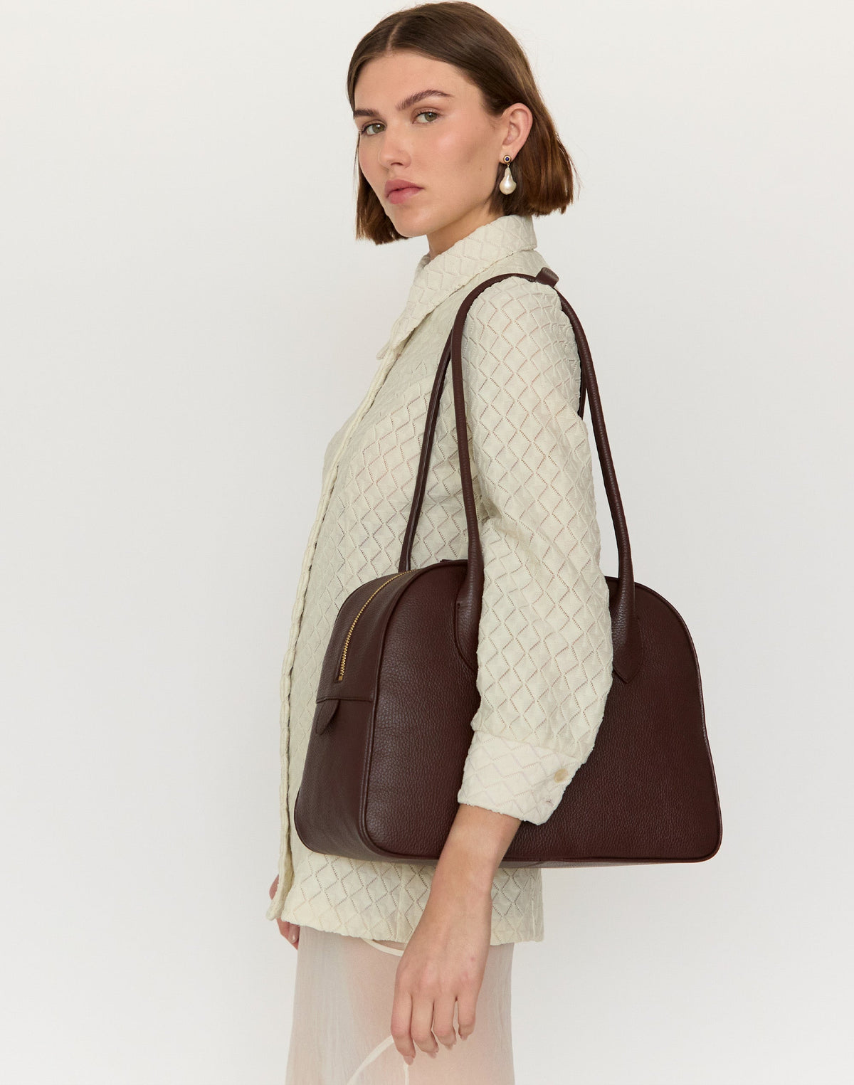 Brown HYER GOODS La Autostrada tote bag with shoulder straps, made of durable material, ideal for everyday carrying.
