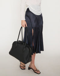 Black HYER GOODS La Autostrada tote bag with sleek design, spacious interior, and sturdy handles for everyday use.