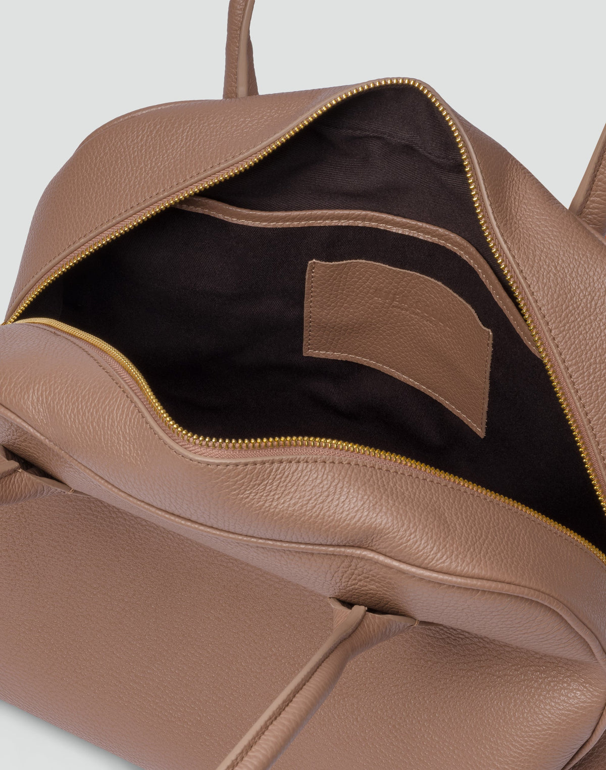 Taupe La Autostrada tote bag by HYER GOODS, featuring durable fabric and spacious interior, shown in a stylish, casual design.