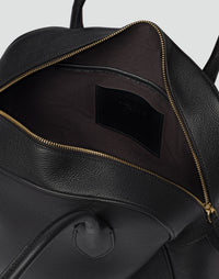 HYER GOODS La Autostrada tote bag in black and gold with sturdy handles and spacious interior for everyday use.