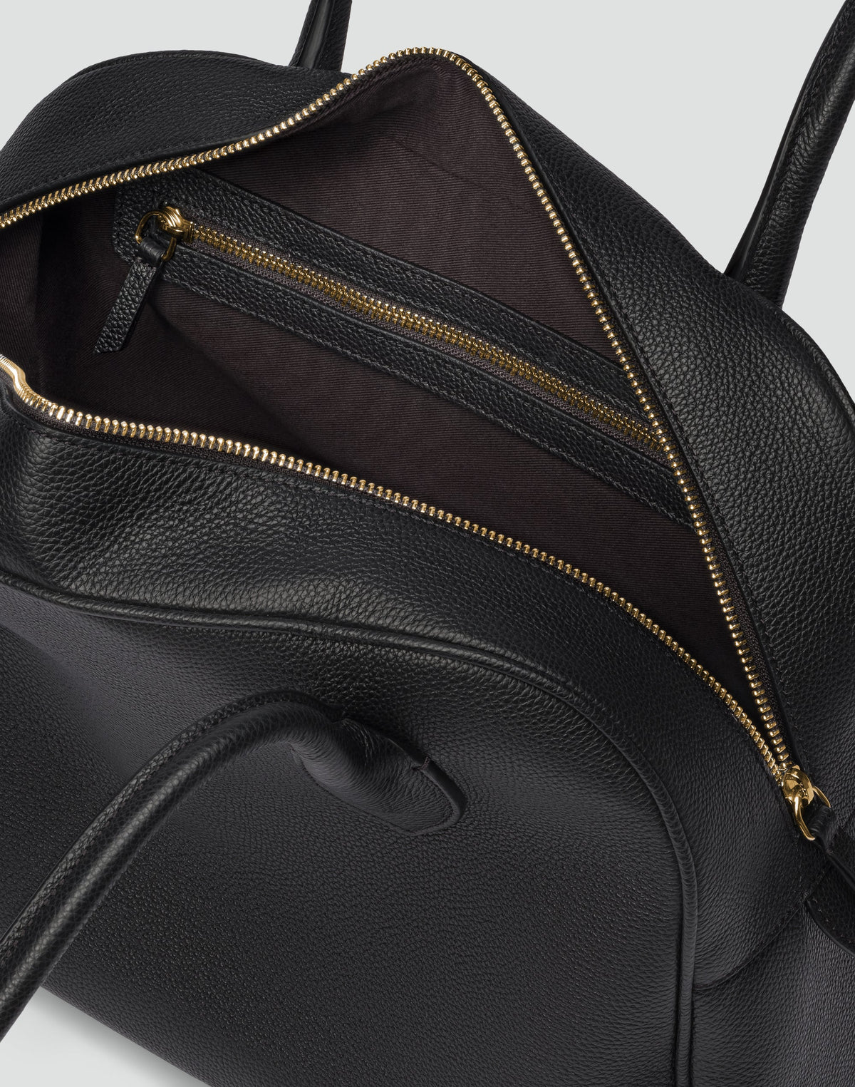 HYER GOODS La Autostrada black and gold tote bag with sturdy handles and spacious interior, stylish and versatile for daily use