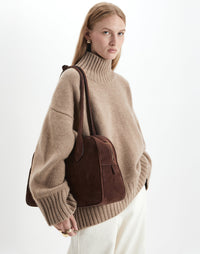 HYER GOODS La Autostrada tote bag in brown suede, showing its spacious design and sturdy handles.