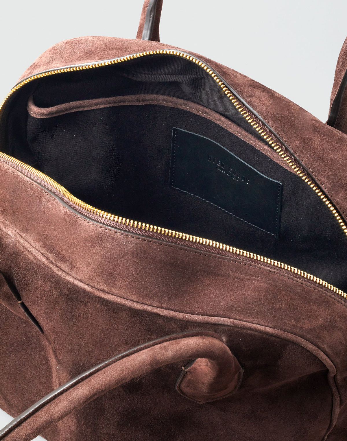 HYER GOODS La Autostrada tote bag in brown suede with sturdy handles and spacious interior, stylish for everyday use.