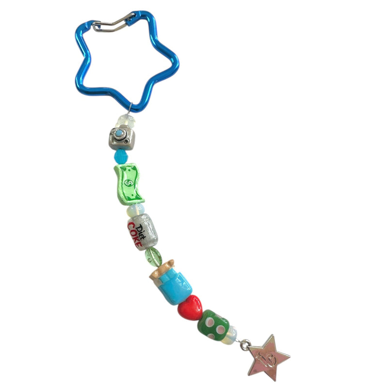 Ian Charms Sleepy Homebody keychain with a cute, detailed sleeping character and soft pastel colors.