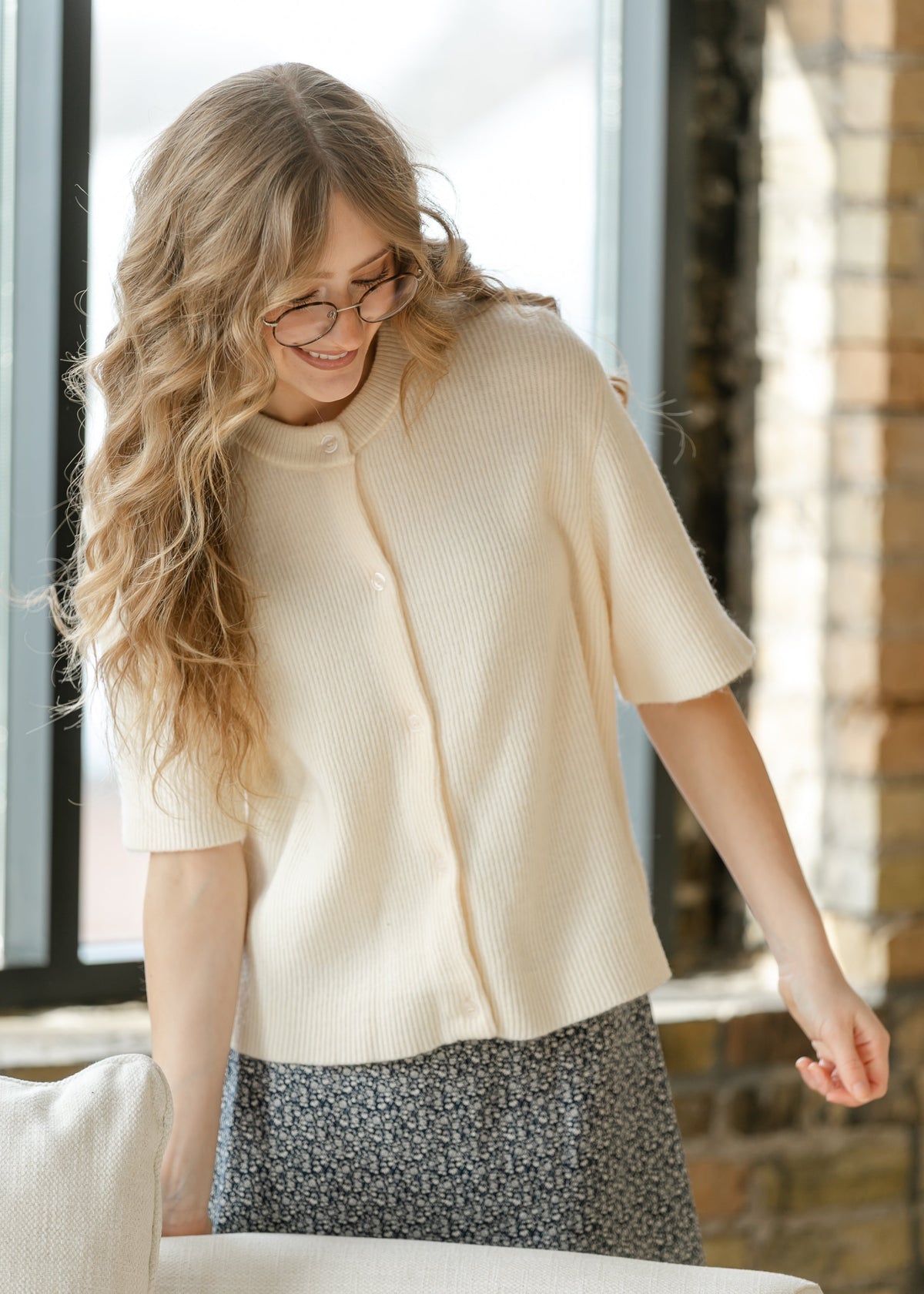 Inherit Co. Zadie Ivory short sleeve button cardigan from IC Layering Essentials, featuring a soft knit and classic design.