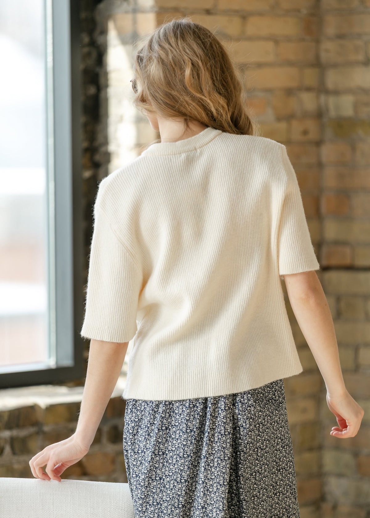 Ivory short sleeve button cardigan from Inherit Co.'s IC Layering Essentials, featuring a cozy, stylish design.