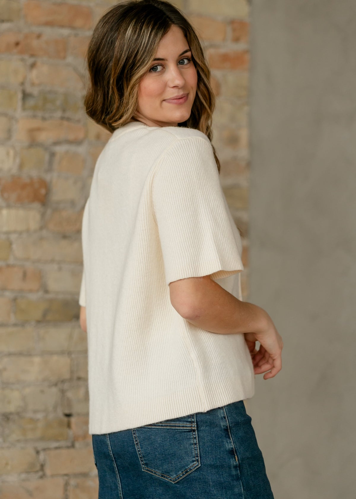 Inherit Co. Zadie ivory short sleeve button cardigan from IC Layering Essentials, featuring a cozy, stylish design with buttons.