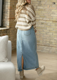 Light wash denim maxi skirt from Inherit Co.'s IC Skirts collection, featuring a flowing design and high-waisted fit.