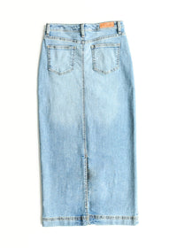 Light wash denim maxi skirt from Inherit Co.'s IC Skirts collection, featuring a flowing design and high waist.