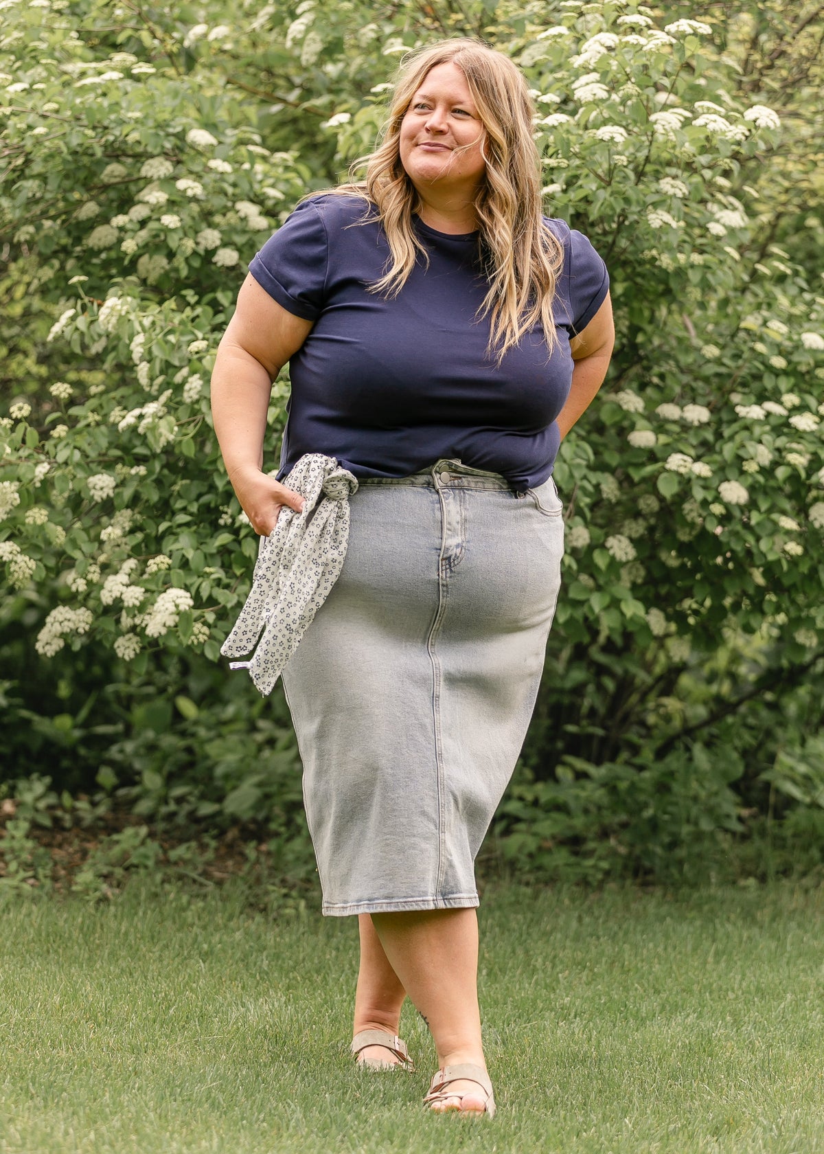 Light wash midi denim skirt from Inherit Co. featuring a classic IC Skirts style, styled with belt loops and front pockets.