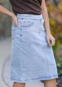 Inherit Co. Sandra Light Wash Denim Midi Skirt from IC Skirts, casual style with a classic denim finish and mid-length design.