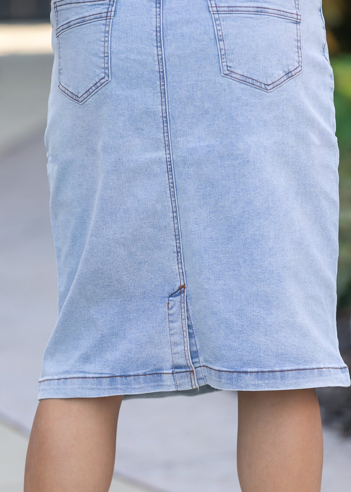 Inherit Co. Sandra light wash denim midi skirt from IC Skirts, showing front view with classic denim texture and midi length.