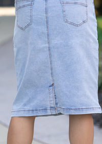 Inherit Co. Sandra light wash denim midi skirt from IC Skirts, showing front view with classic denim texture and midi length.