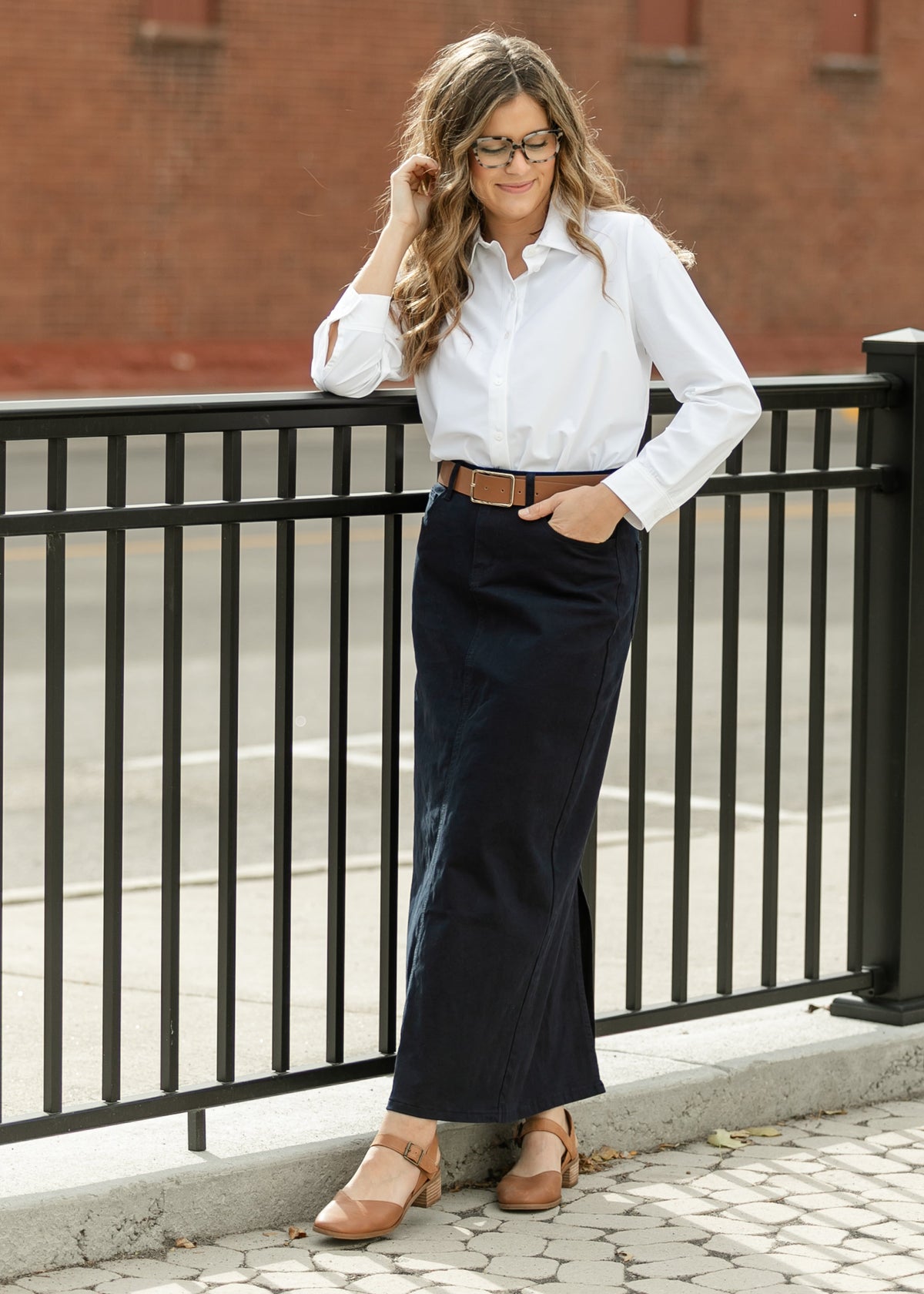 Inherit Co. Stella Navy Maxi Denim Skirt featuring a flowing design and classic denim texture, displayed on a plain background.