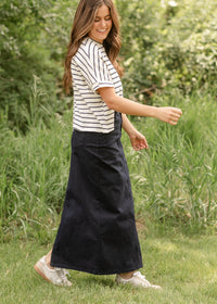 Navy maxi denim skirt from IC Skirts by Inherit Co., featuring a flowing design and classic denim fabric.