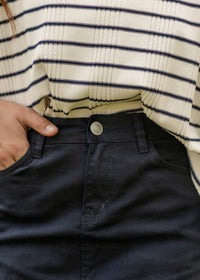 Navy maxi denim skirt from IC Skirts by Inherit Co., featuring a flowing design and classic denim texture.