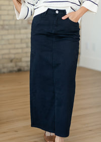 Navy Stella Maxi Denim Skirt by Inherit Co. featuring a flowing design and classic denim fabric, styled with a high waist.