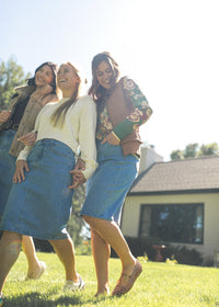 Inherit Co. Remi Denim Classic Wash Midi Skirt from IC Skirts collection, showcasing a stylish mid-length denim skirt with a classic wash.