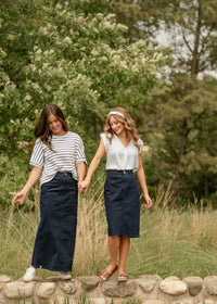 Inherit Co. Remi Navy Denim Midi Skirt, stylish IC skirt with a mid-length design and classic denim texture, displayed on a plain background.