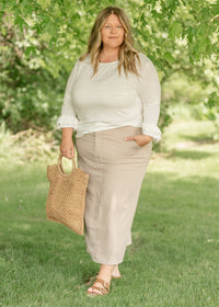 Inherit Co. Dylan Midi Trouser Skirt in XS, featuring a sleek, tailored design with a high waist and classic midi length.