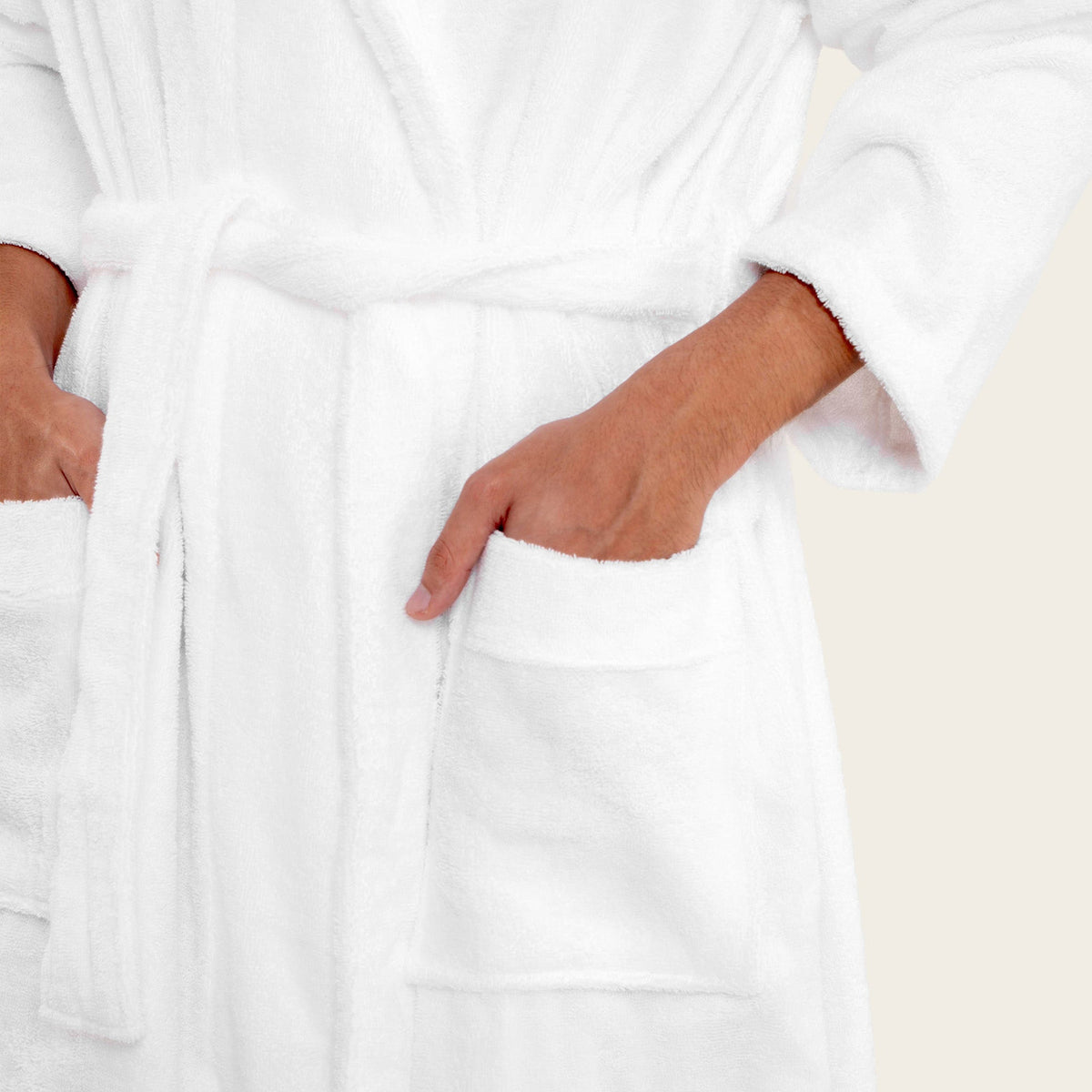 Dusk white Italic Ultraplush Australian Cotton bathrobe hanging on a hook, soft and cozy fabric, small size, luxurious bathrobe for comfort