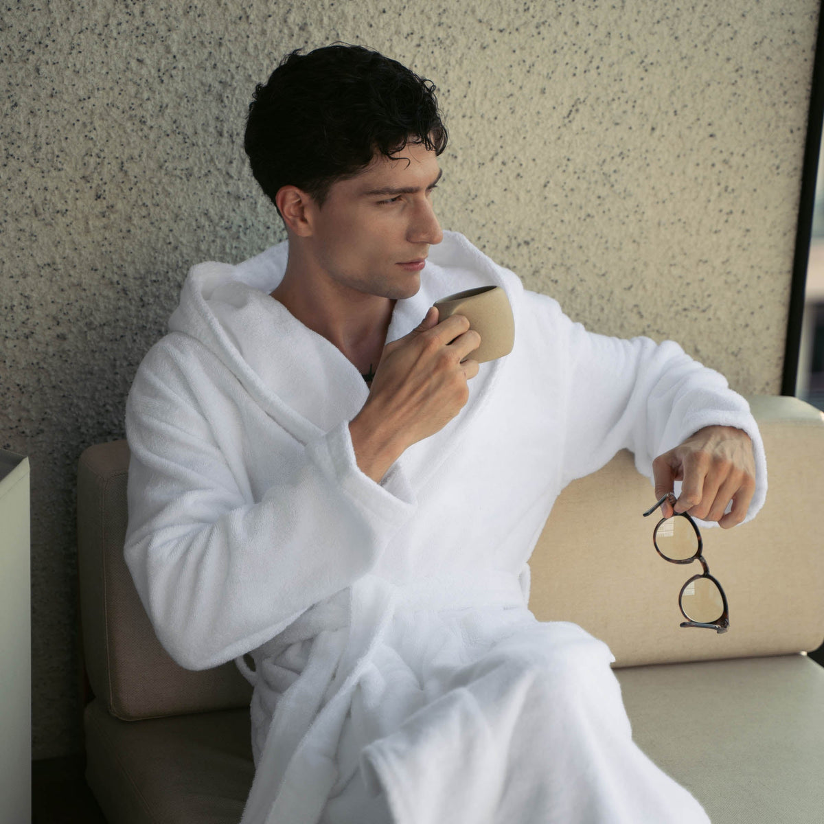 Dusk white Italic Ultraplush Australian Cotton Bathrobe hanging, soft plush fabric, cozy and comfortable for relaxing at home.
