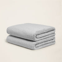 Set of two Italic Ultraplush Australian Cotton Bath Towels with soft, plush texture for home use.